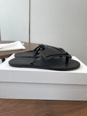 THE ROW 26S T STRAP THONG SANDALS IN BLACK CALFSKIN