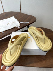 THE ROW 26S PUFFED THONG SANDALS IN BUTTER YELLOW CALFSKIN