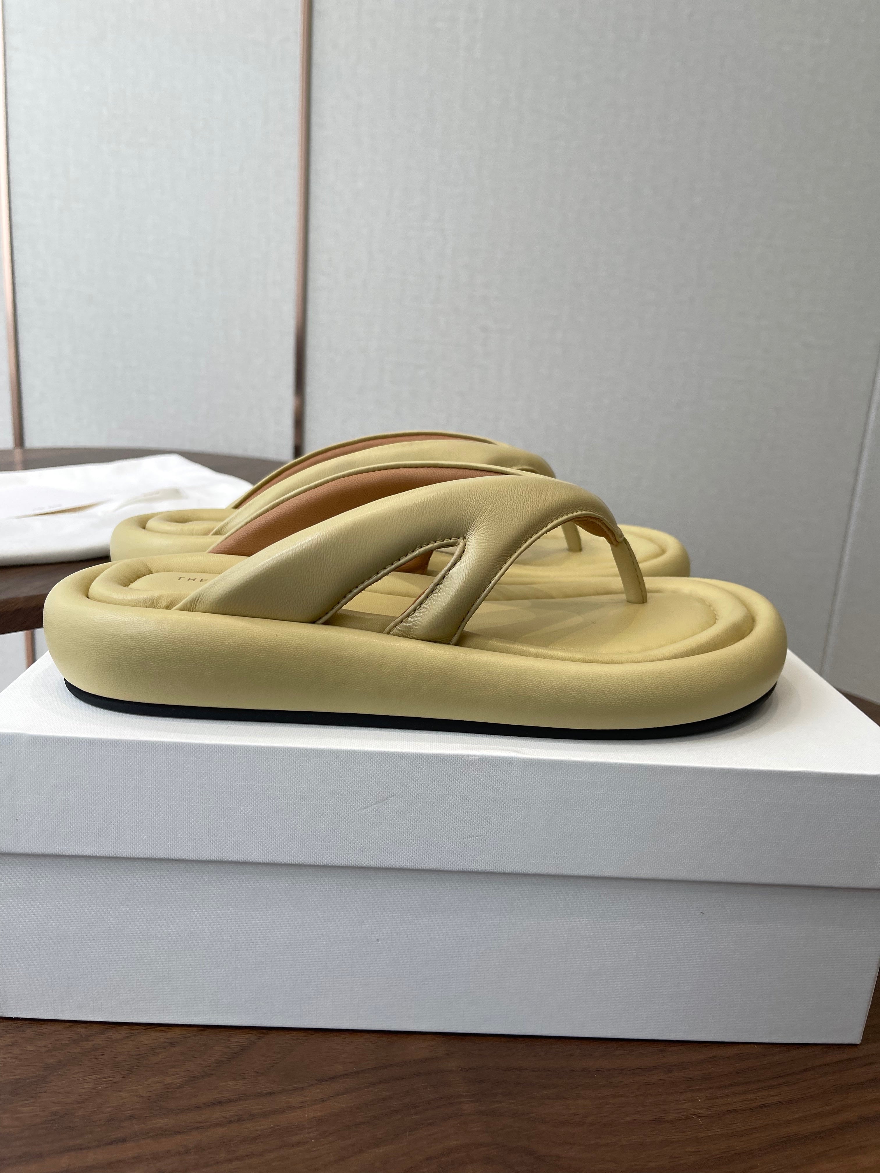 THE ROW 26S PUFFED THONG SANDALS IN BUTTER YELLOW CALFSKIN