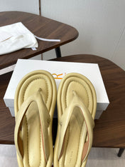 THE ROW 26S PUFFED THONG SANDALS IN BUTTER YELLOW CALFSKIN