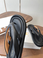 THE ROW 26S PUFFED THONG SANDALS IN BLACK CALFSKIN