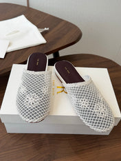 THE ROW 26S MULE FLATS IN WHITE CROCHET MESH