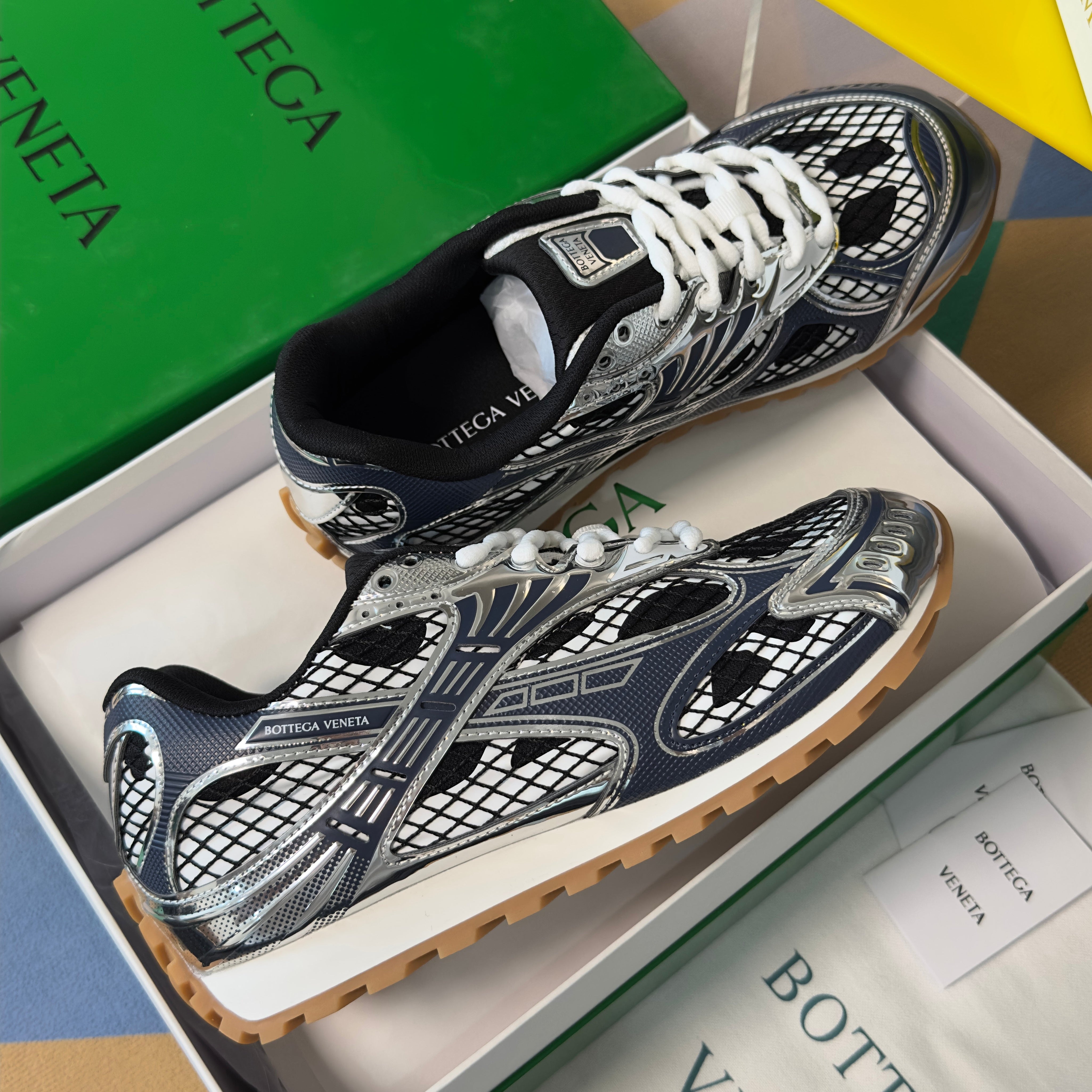 BOTTEGA VENETA 26S SNEAKERS IN DARK BLUE GREY AND SILVER TPU MATERIAL