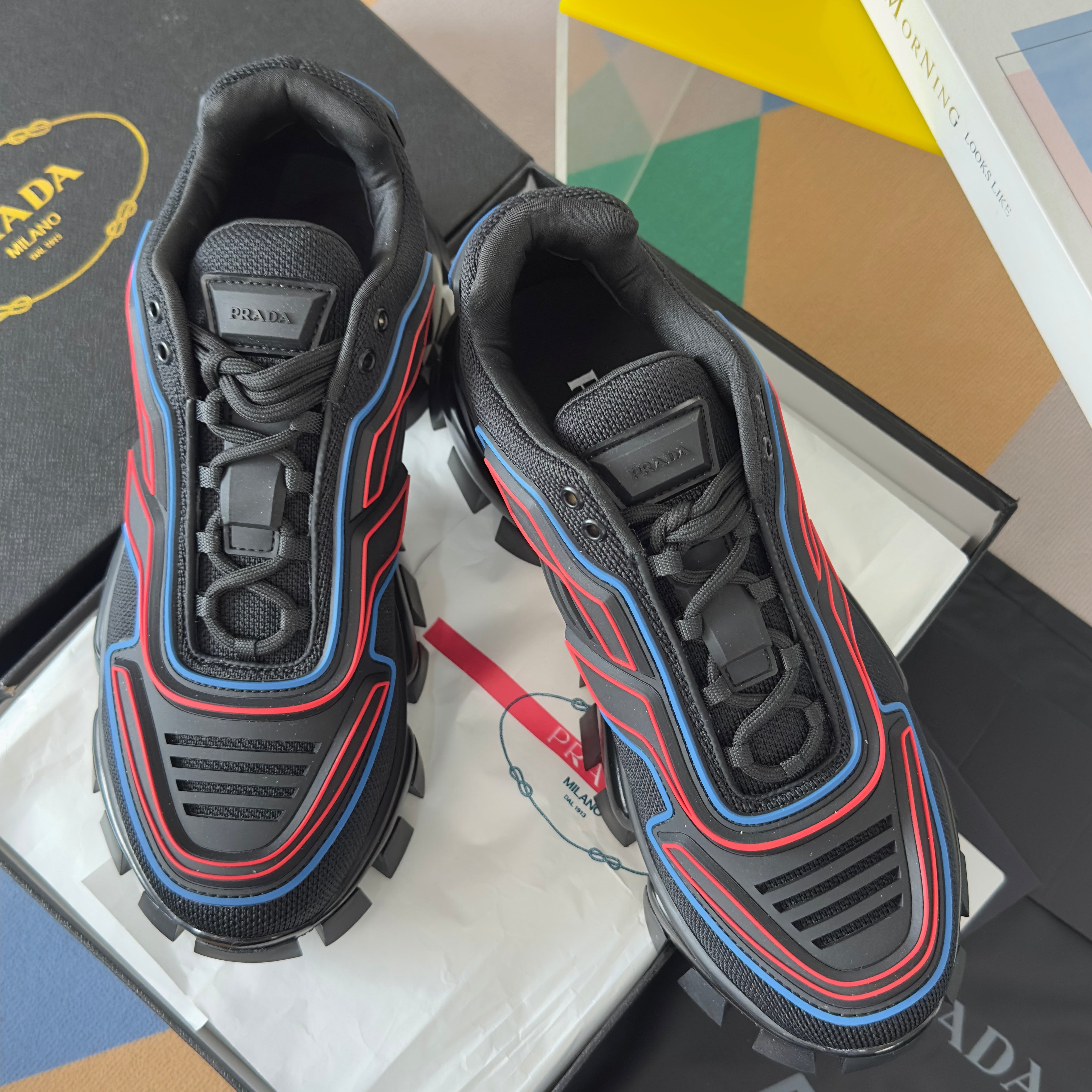 PRADA 26S CLOUDBUST THUNDER SNEAKERS 60MM IN BLACK AND RED MESH FABRIC AND TPU