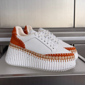 CHLOÉ 26S WEDGE SNEAKERS 70 MM IN WHITE CALFSKIN AND ORANGE SUEDE