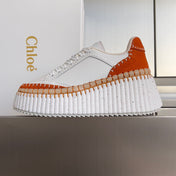 CHLOÉ 26S WEDGE SNEAKERS 70 MM IN WHITE CALFSKIN AND ORANGE SUEDE