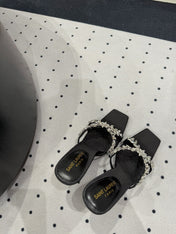 HIGH RHINESTONE CROSS STRAP MULES IN BLACK SILK