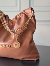 CHANEL 26S 22 BAG 42 IN CARAMEL BROWN QUILTED SHINY CALFSKIN
