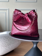 CHANEL 26S 22 BAG 42 IN BURGUNDY QUILTED SHINY CALFSKIN