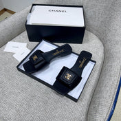 CHANEL 26S FLAT SLIDES IN BLACK LAMBSKIN