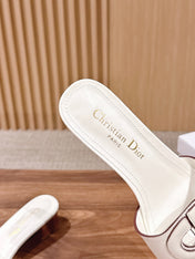 DIOR 26S LOW HEEL SLIDE SANDALS IN WHITE CALFSKIN PEARL GOLD BUCKLE