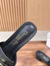 DIOR 26S LOW HEEL SLIDE SANDALS IN BLACK CALFSKIN GOLD PEARL BUCKLE