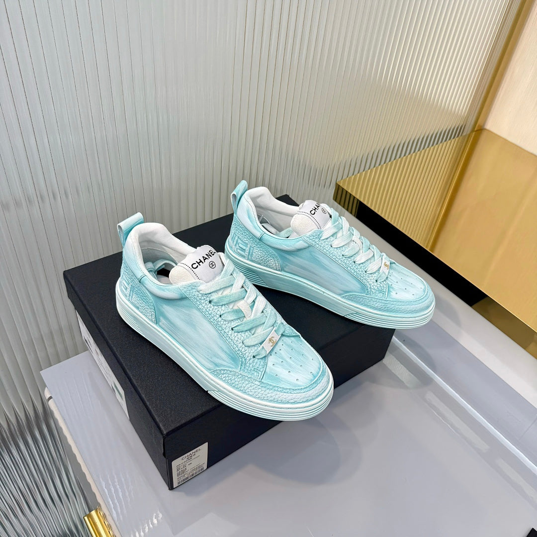 CHANEL 26S LOW-TOP SNEAKERS IN LIGHT MINT BLUE CALFSKIN