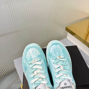 CHANEL 26S LOW-TOP SNEAKERS IN LIGHT MINT BLUE CALFSKIN