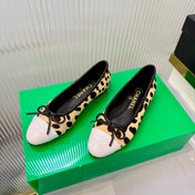CHANEL 26S FLAT SHOES IN LIGHT YELLOW AND BLACK LEOPARD PRINT PONY HAIR