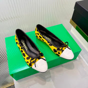 CHANEL 26S FLAT SHOES IN YELLOW AND BLACK LEOPARD PRINT PONY HAIR