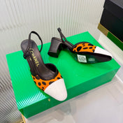CHANEL 26S HIGH-HEEL SLINGBACKS 50 MM IN WHITE CALFSKIN WITH ORANGE PONY HAIR