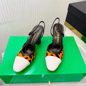 CHANEL 26S HIGH-HEEL SLINGBACKS 70 MM IN WHITE PATENT CALFSKIN WITH ORANGE PONY HAIR