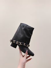 CHANEL 25S CALF-LENGTH BOOTS 45MM IN BLACK CALFSKIN GOLD HARDWARE