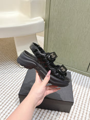 CHANEL 25S SANDALS IN BLACK PATENT CALFSKIN GOLD HARDWARE