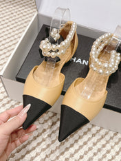 CHANEL 25S ESPADRILLE FLATS IN BEIGE AND BLACK CALFSKIN WITH PEARL STRAP