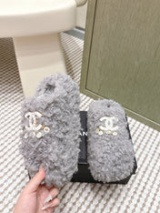 CHANEL 25S CLASSIC FURRY SLIDES IN GRAY WITH DOUBLE C LOGO