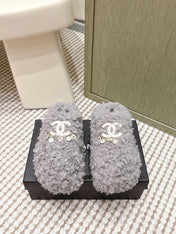 CHANEL 25S CLASSIC FURRY SLIDES IN GRAY WITH DOUBLE C LOGO