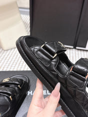 CHANEL 26S QUILTED DAD SANDALS IN BLACK CALFSKIN