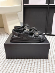 CHANEL 26S QUILTED DAD SANDALS IN BLACK CALFSKIN