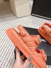CHANEL 26S QUILTED DAD SANDALS IN ORANGE CALFSKIN