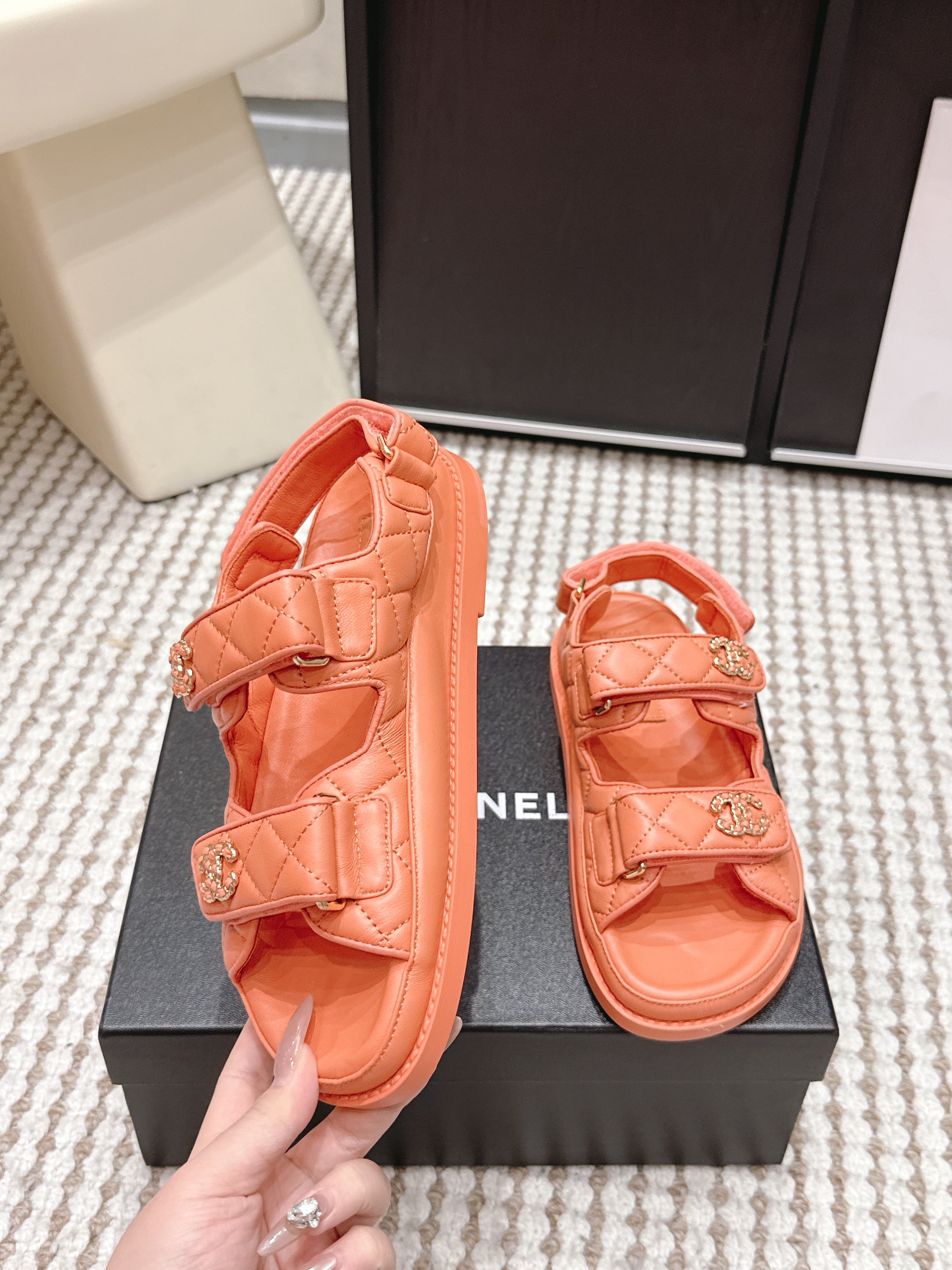 CHANEL 26S QUILTED DAD SANDALS IN ORANGE CALFSKIN
