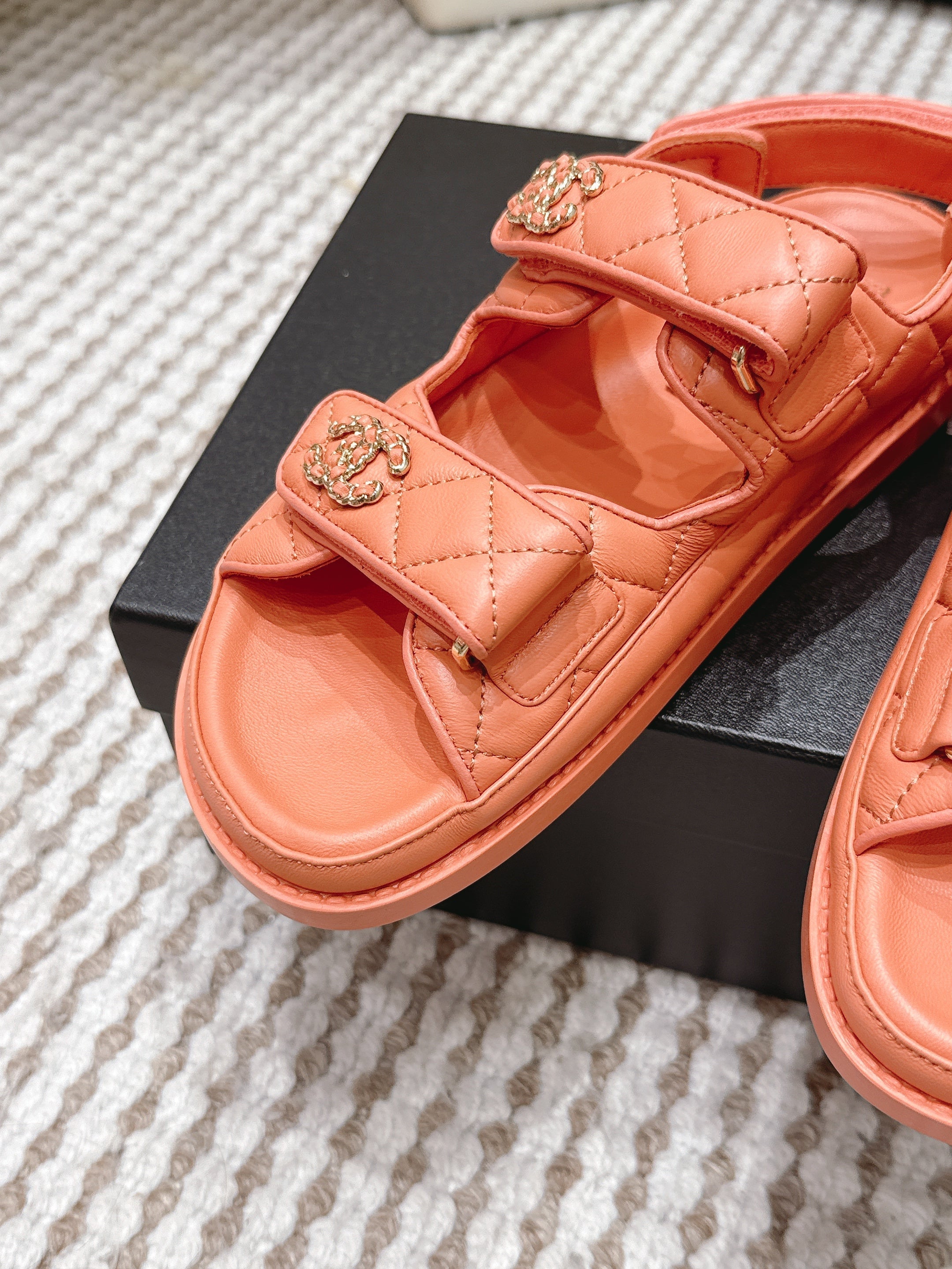 CHANEL 26S QUILTED DAD SANDALS IN ORANGE CALFSKIN