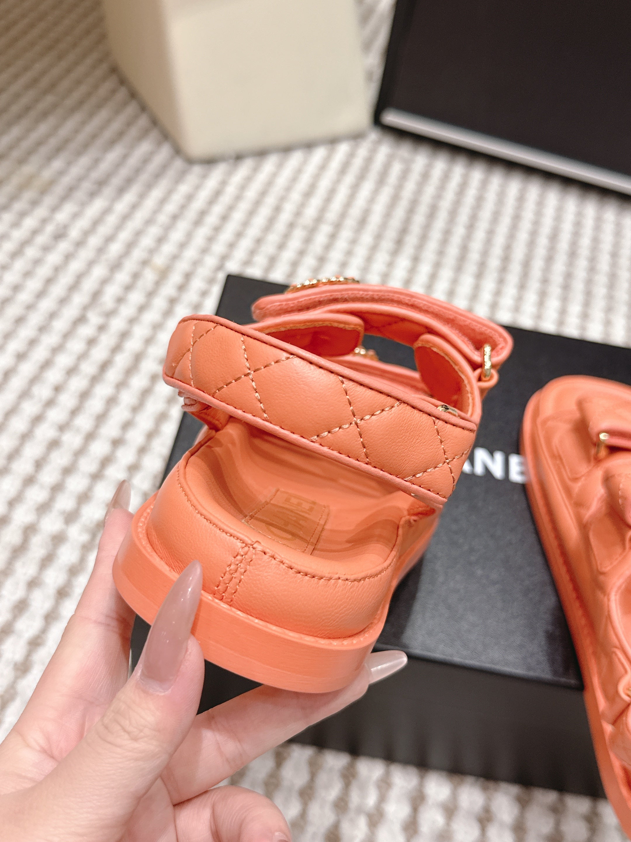 CHANEL 26S QUILTED DAD SANDALS IN ORANGE CALFSKIN