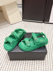 CHANEL 26S QUILTED DAD SANDALS IN GREEN CALFSKIN