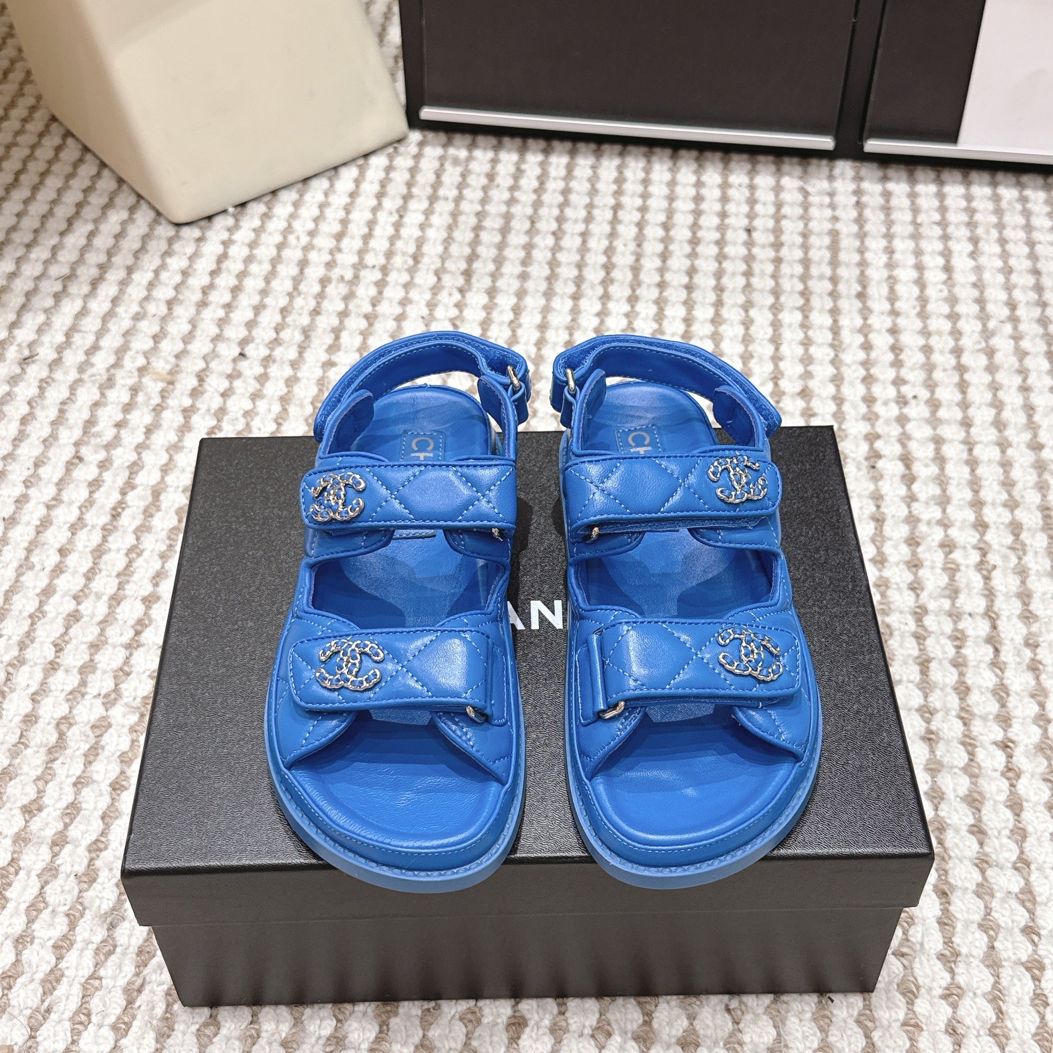 CHANEL 26S QUILTED DAD SANDALS IN BLUE CALFSKIN