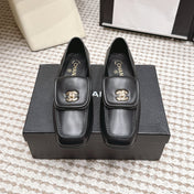 CHANEL 26S LOAFERS IN BLACK CALFSKIN WITH GOLD-TONE CC LOGO