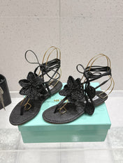 AQUAZZURA 26S FLORAL THONG SANDALS IN BLACK WOVEN RAFFIA