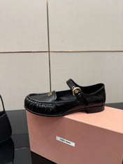 MIUMIU 25S LOAFERS WITH STRAP IN BLACK LAMBSKIN