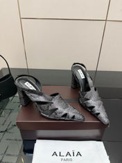 ALAIA 26S HEELED SLINGBACKS IN BLACK PYTHON-EMBOSSED LEATHER