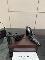 ALAIA 26S HEELED SLINGBACKS IN BLACK CROC-EMBOSSED LEATHER
