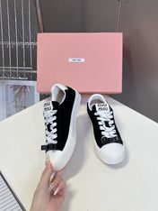 MIUMIU 25S SNEAKERS IN BLACK SUEDE