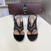 ALAIA 26S MESH THONG HEELS 55 MM IN BLACK PATENT CALFSKIN