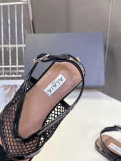 ALAIA 26S FLAT MESH THONG SANDALS IN BLACK PATENT CALFSKIN