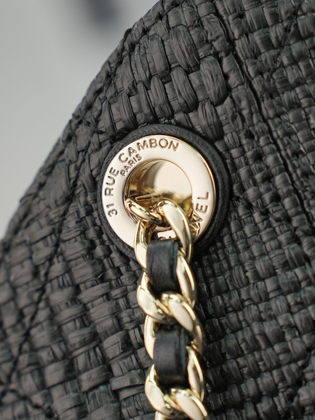 CHANEL 25S SHOULDER BAG 32 IN BLACK RAFFIA AND CALFSKIN GOLD HARDWARE