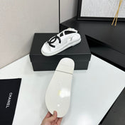 CHANEL 26S FLAT SANDALS IN WHITE LAMBSKIN WITH BLACK OVERSIZED CC LOGO