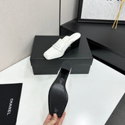 CHANEL 26S MULE PUMPS IN WHITE PATENT CALFSKIN