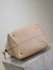 YSL 25S LE 5 À 7 BUCKET 26 IN NUDE CALFSKIN GOLD HARDWRE