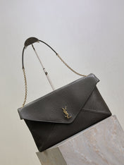 YSL 25S CASSANDRE ENVELOPE MESSENGER 35 IN LIGHT MUSK LAMBSKIN GOLD HARDWARE
