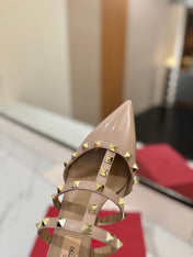 VALENTINO 26S STUDDED HEELED MULES 50 MM IN NUDE PATENT CALFSKIN