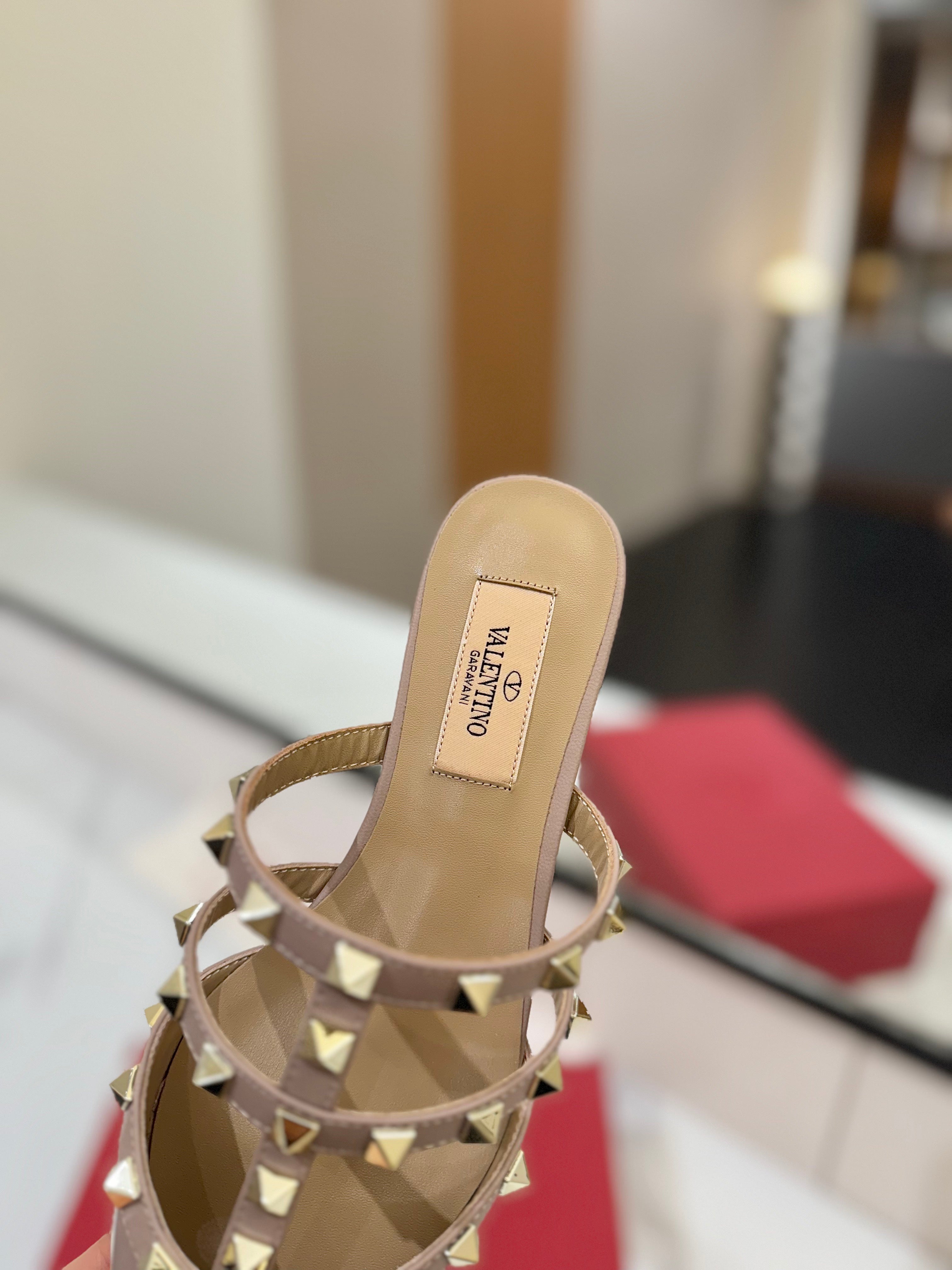 VALENTINO 26S STUDDED FLAT MULES IN NUDE PATENT CALFSKIN